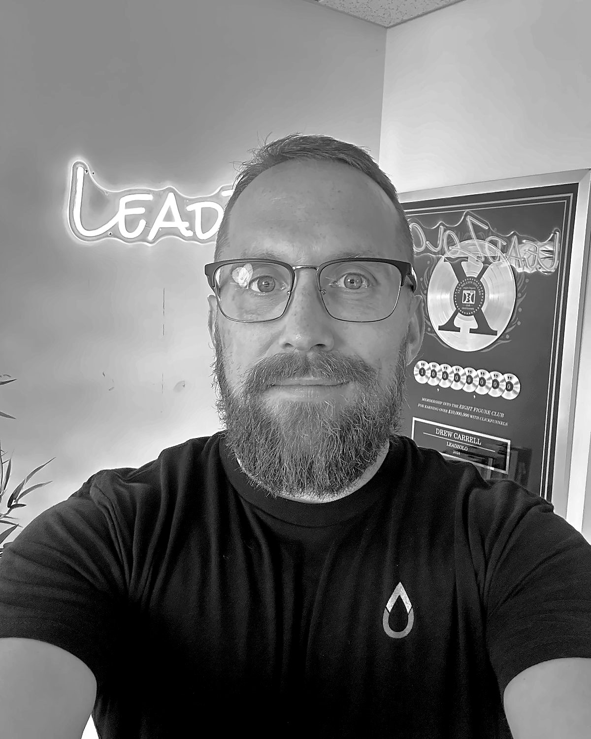 Drew Carrell headshot, black and white